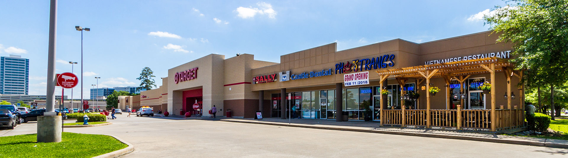 A sunny outdoor strip mall